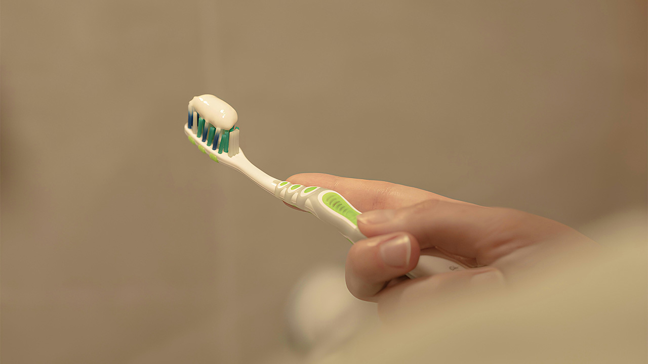 New toothbrush, with toothpaste