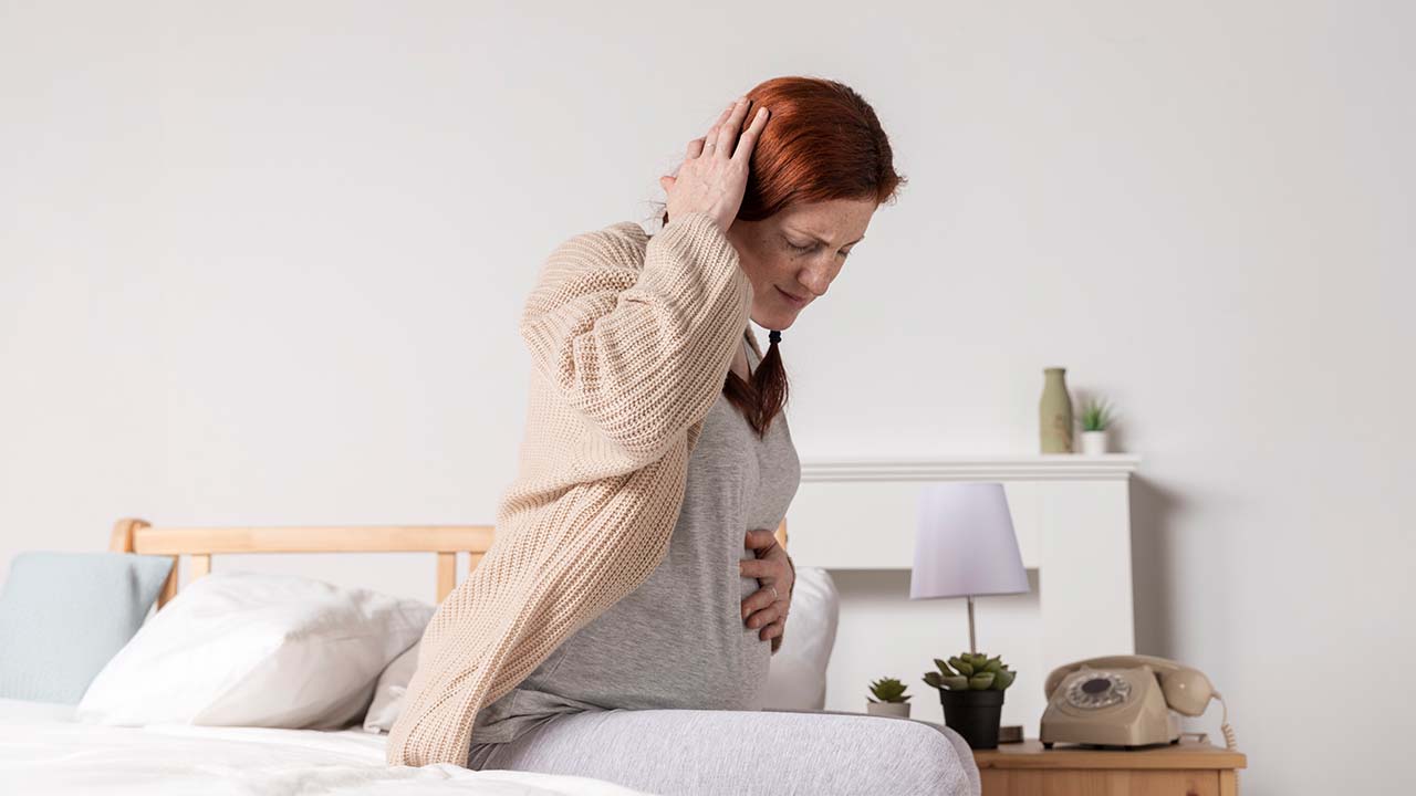 A lady with headache and hunger pangs